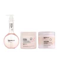 Perfect Volume Shampoo, Perfect Clean 2-in-1 Scalp Scrub & Clarifying Shampoo: Sakura, and Perfect Volume Thickening & Conditioning Hair Masque pictured in a row together with a plain white background. 