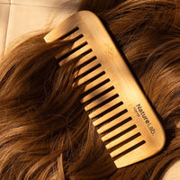 bamboo comb on hair